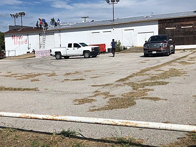 XS Roofing and Construction crew at work