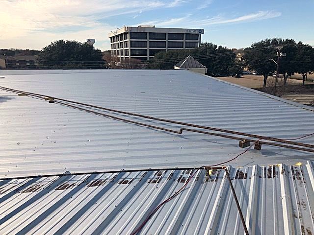 XS Roofing and Construction crew at work