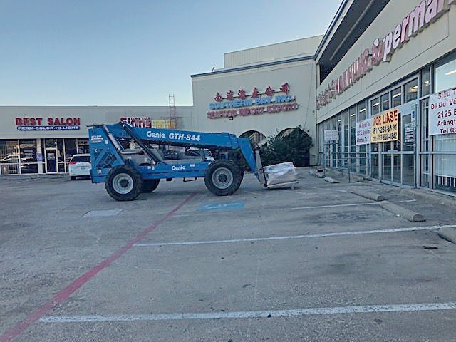 XS Roofing and Construction crew at work